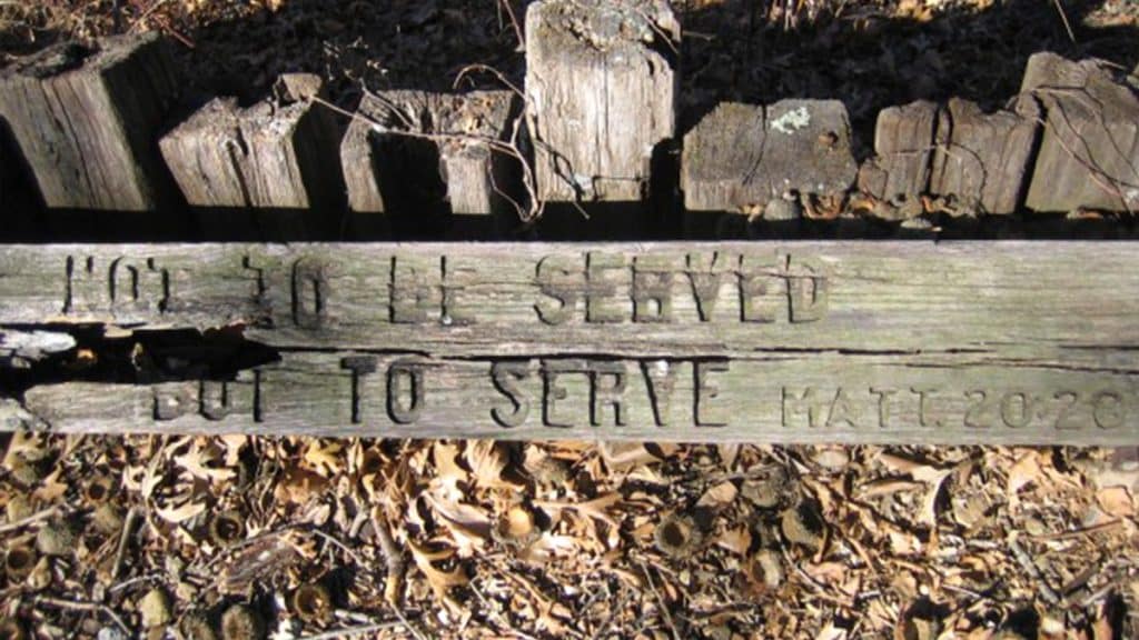 wood piece with Matthew 20:28 written on it